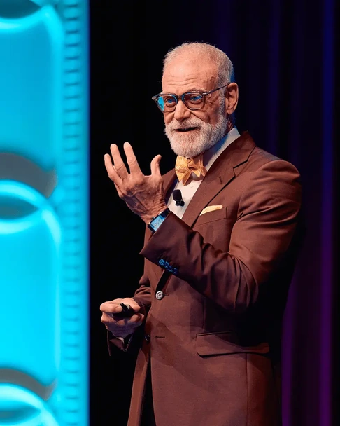 William Seeds, MD speaking on stage